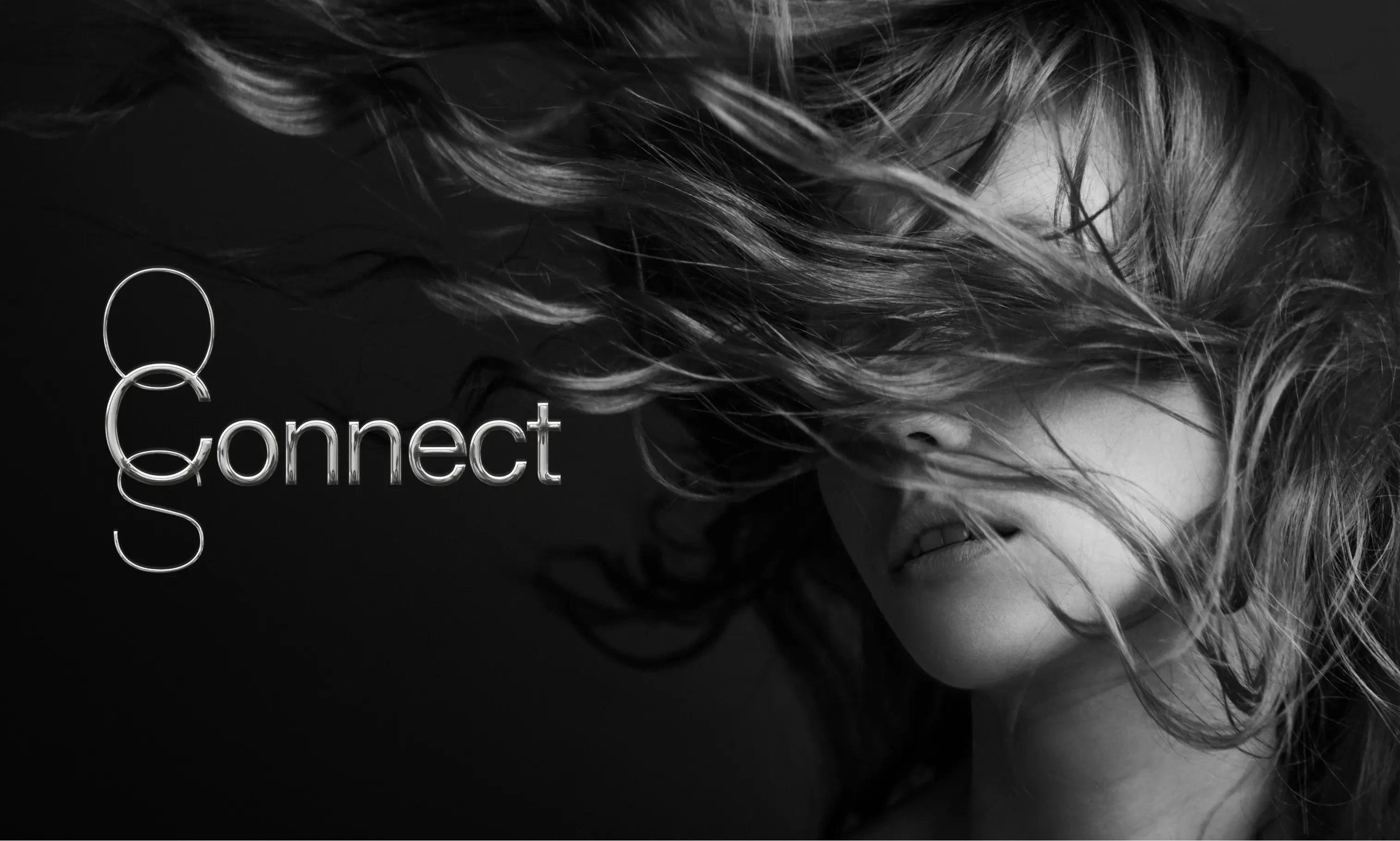 Black and white image of a person with flowing hair and the word ' OCS Connect'.
